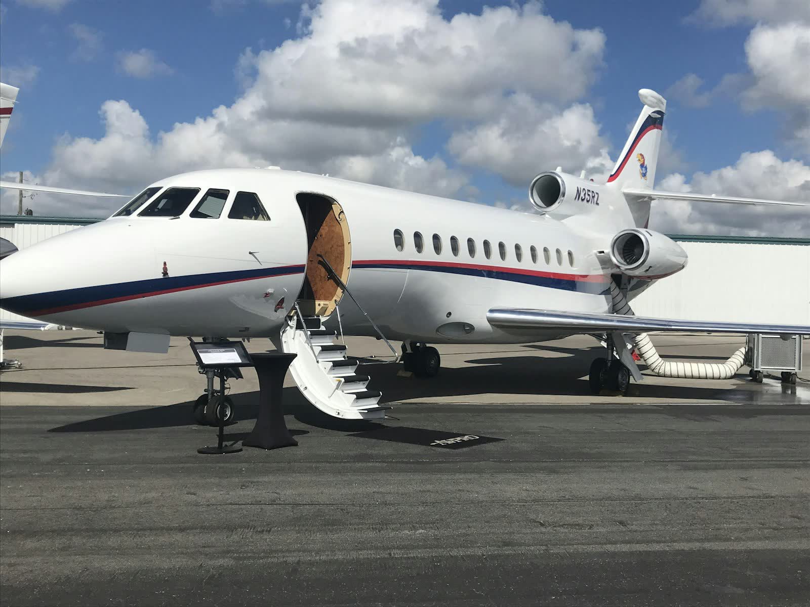 Business jet on the ramp with airstair deployed